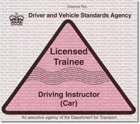 Front of trainee driving instructor's pink licence